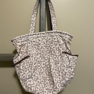 Thirty-One bag/matching wallet. Slight discoloration on one side (pictured).